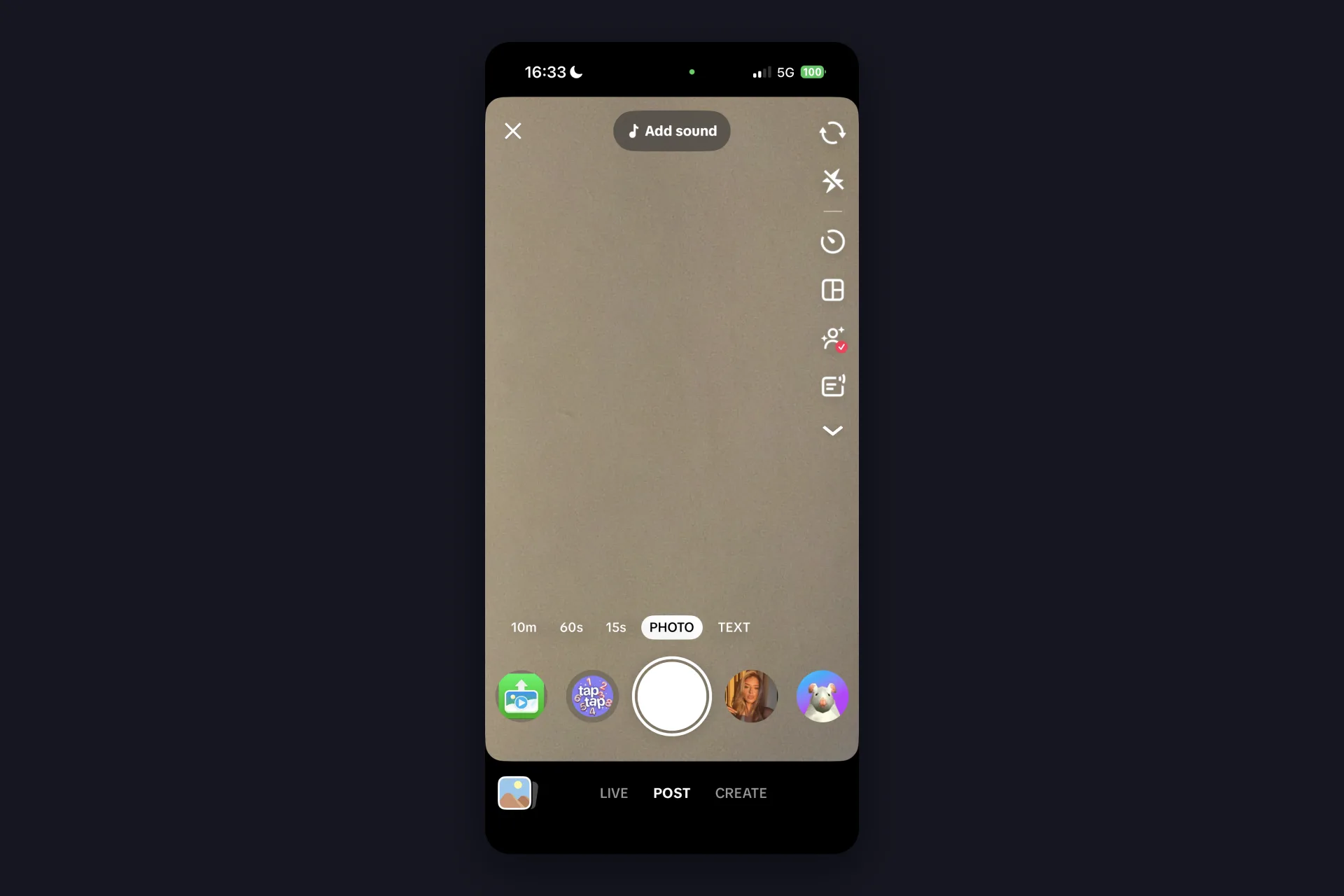 Screenshot - TikTok iOS app - camera screen in POST mode with the 10m, 60s, 15s, PHOTO and TEXT options and the LIVE, POST, CREATE row at the very bottom
